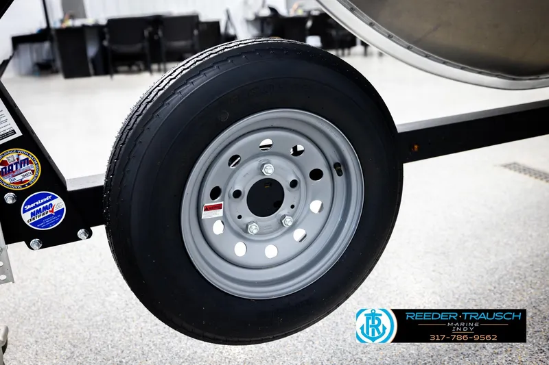 Slide: The Image of Trailer wheel of 2026 Lund 1600 Fury Tiller boat at Reeder Trausch Marine. - 38
