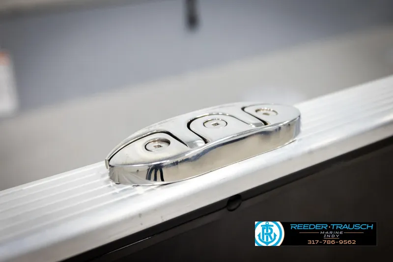 Slide: The Image of Close-up of 2026 Lund 1600 Fury Tiller boat cleat, featuring sleek chrome finish. - 40