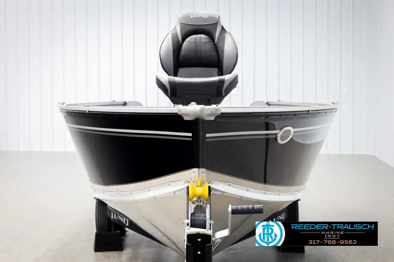 Slide: The Image of 2026 Lund 1600 Fury Tiller boat in showroom, front view. - 7