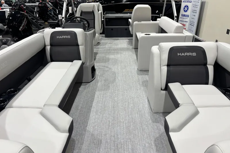 Slide: The Image of 2026 Harris Cruiser 210 pontoon boat interior with gray seating and modern design. - 7
