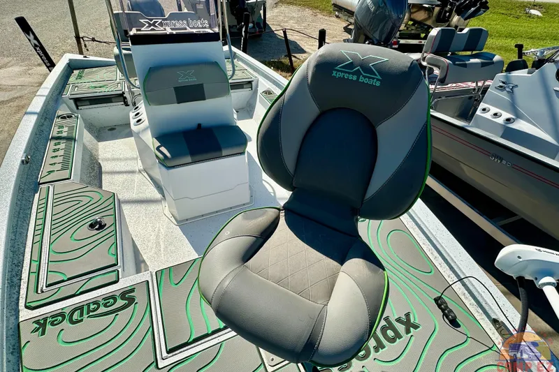 Slide: The Image of 2024 Xpress H20B Bay boat interior with seating and deck design. - 12