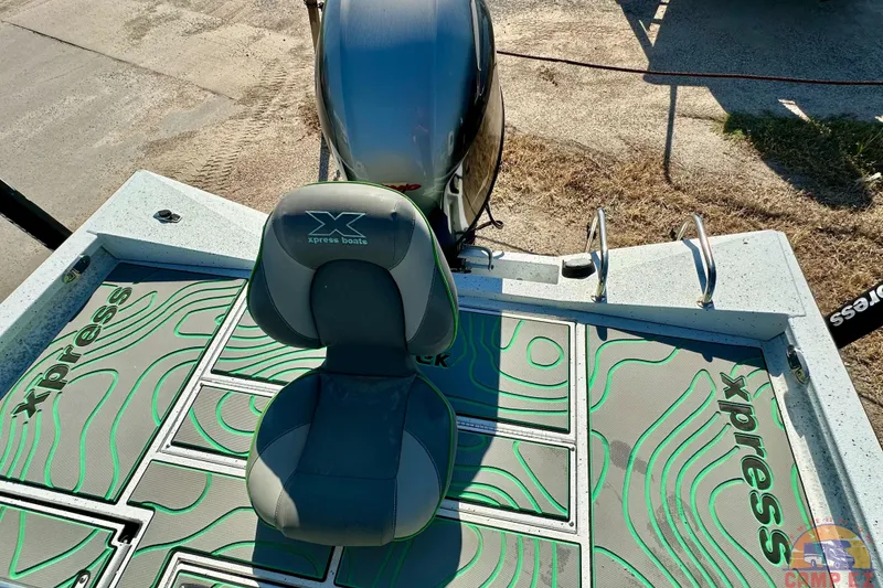 Slide: The Image of 2024 Xpress H20B Bay boat with custom seating and modern design. - 22