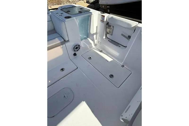 Slide: The Image of 2025 Sea Fox 288 Traveler boat interior with seating and storage compartments. - 7