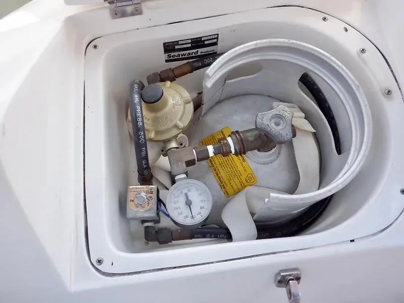 Slide: The Image of Propane tank compartment in a 2000 Catalina 320 boat, featuring Seaward components. - 25