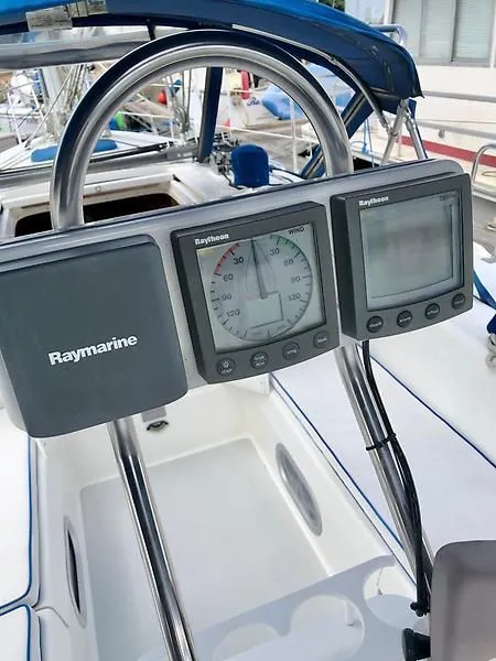 Slide: The Image of Raymarine navigation instruments on a 2000 Catalina 320 sailboat cockpit. - 29