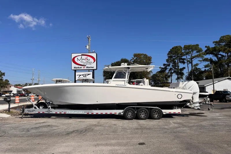 The Image of 2019 Fountain 38 Center Console boat on trailer at Marker 17 Marine dealership. - 0