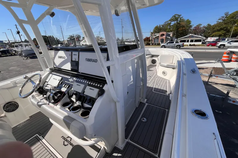 Slide: The Image of 2019 Fountain 38 Center Console boat with advanced Simrad navigation system. - 10