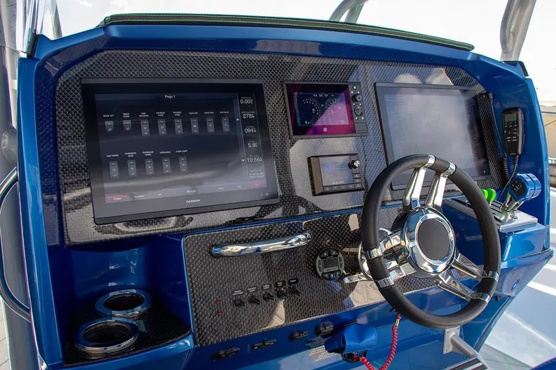 Slide: The Image of Manufacturer Provided Image: 2025 Nor-Tech 340 Sport Center Console dashboard with advanced navigation and control systems. - 10