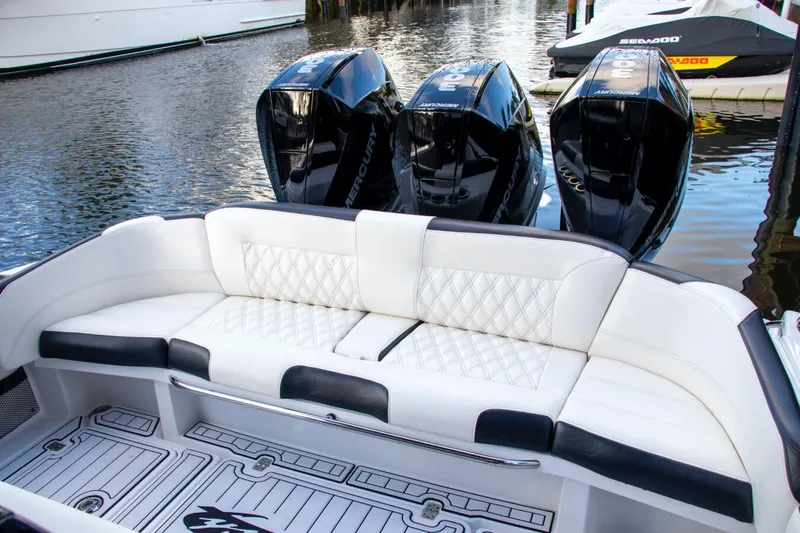 Slide: The Image of Manufacturer Provided Image: 2025 Nor-Tech 340 Sport Center Console with triple engines and luxurious seating. - 13