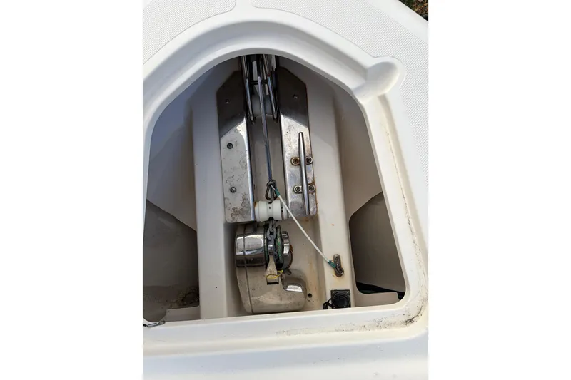 Slide: The Image of Anchor compartment of 2012 Pursuit DC 265 Dual Console boat. - 11