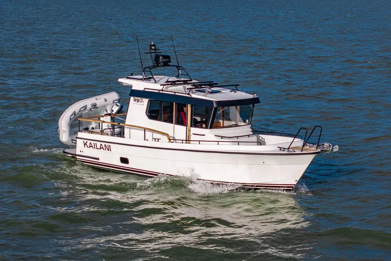 The Image of 2023 Targa 27.2 boat named Kailani cruising on open water. - 0