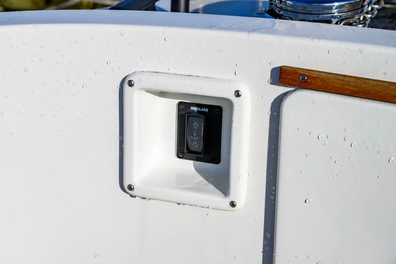 Slide: The Image of Close-up of 2023 Targa 27.2 boat's winch control panel with water droplets. - 16