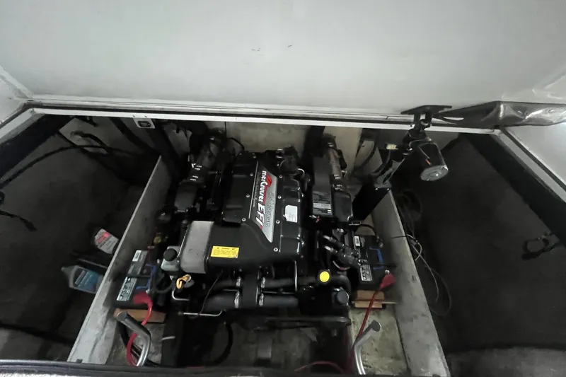 Slide: The Image of Engine compartment of a 1995 Cobalt 252 boat with MerCruiser EFI engine. - 25