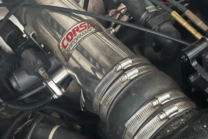 Slide: The Image of Corsa Performance engine component in a 1995 Cobalt 252 boat. - 26