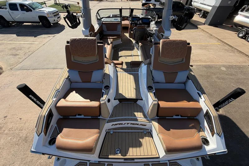 Slide: The Image of 2022 Nautique Super Air Nautique G25 Paragon interior with luxurious seating and modern design. - 10