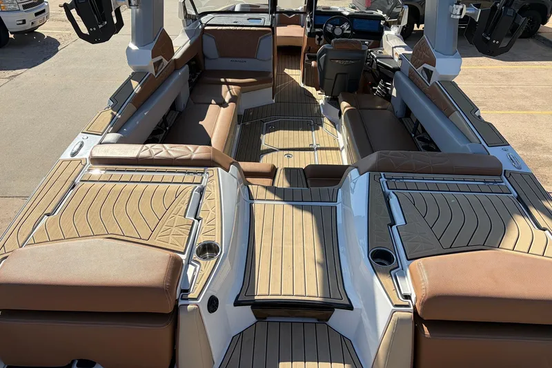 Slide: The Image of 2022 Nautique Super Air Nautique G25 Paragon interior with luxurious seating and modern design. - 11