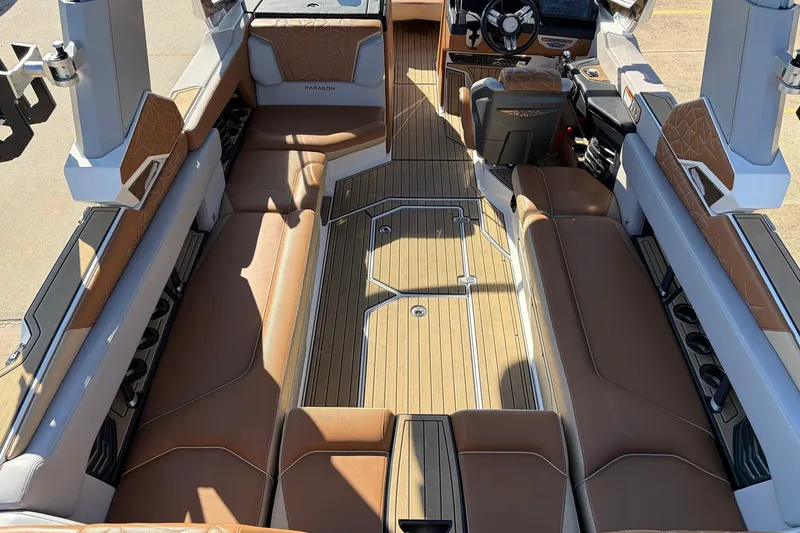 Slide: The Image of 2022 Nautique Super Air Nautique G25 Paragon interior with luxurious seating and modern design. - 12