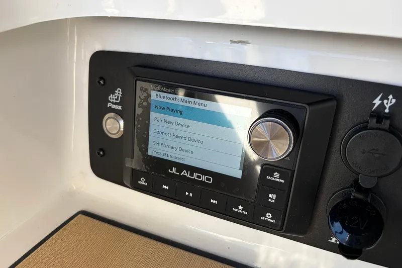 Slide: The Image of 2022 Nautique Super Air G25 Paragon JL Audio system with Bluetooth menu display. - 27