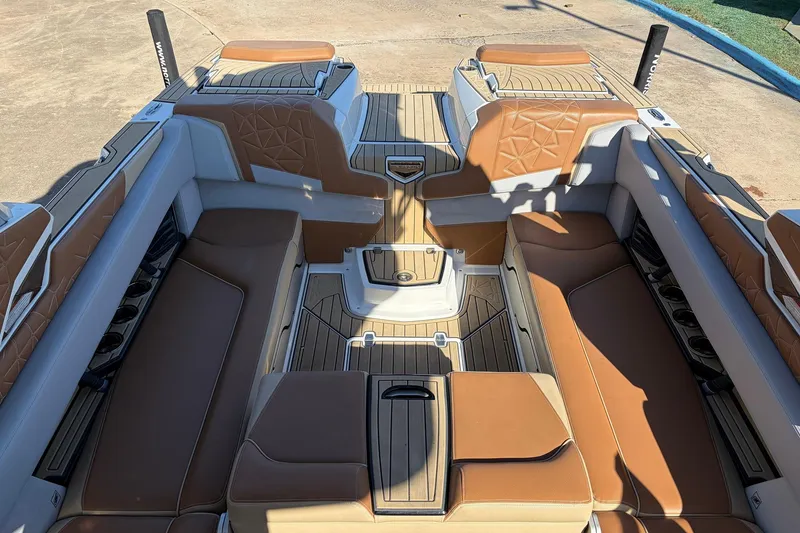 Slide: The Image of 2022 Nautique Super Air Nautique G25 Paragon interior with luxurious tan seating and sleek design. - 41