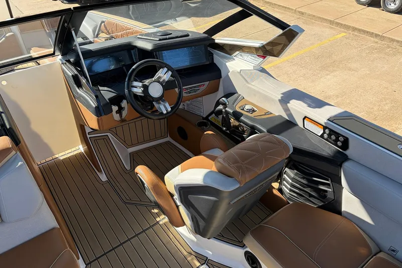 Slide: The Image of 2022 Nautique Super Air Nautique G25 Paragon interior with luxury seating and advanced controls. - 51