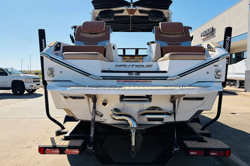 Slide: The Image of 2022 Nautique Super Air Nautique G25 Paragon boat rear view at dealership. - 6