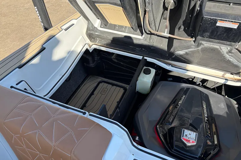 Slide: The Image of 2022 Nautique Super Air Nautique G25 Paragon engine compartment with PCM engine visible. - 61