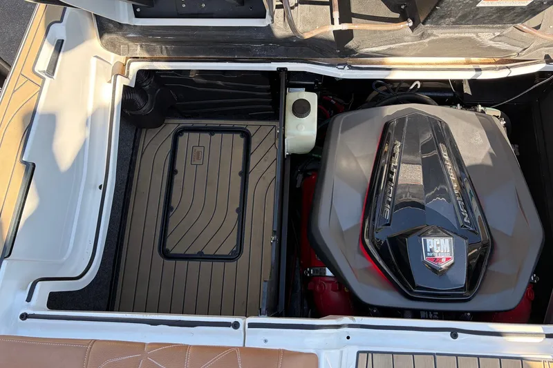 Slide: The Image of 2022 Nautique Super Air Nautique G25 Paragon engine compartment with PGM engine. - 64
