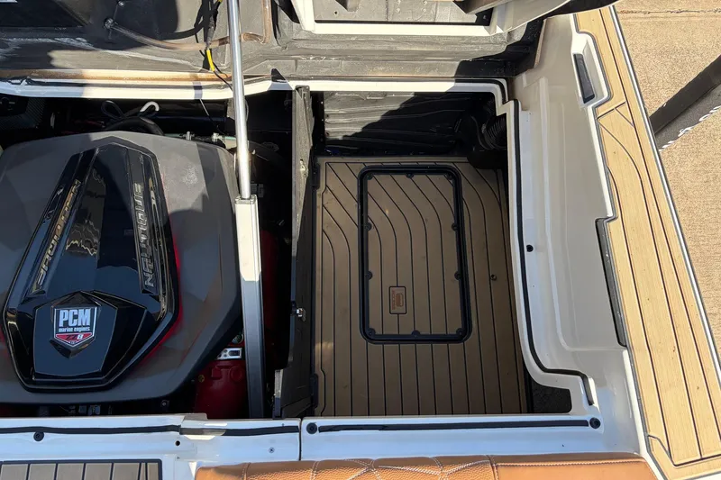 Slide: The Image of Engine compartment of 2022 Nautique Super Air Nautique G25 Paragon boat. - 65