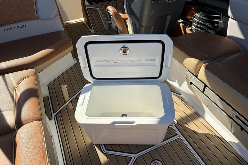 Slide: The Image of 2022 Nautique Super Air Nautique G25 Paragon interior with open cooler on deck. - 70
