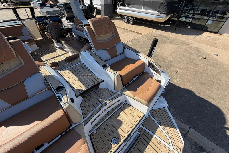 Slide: The Image of 2022 Nautique Super Air Nautique G25 Paragon boat interior with luxurious seating and deck. - 74