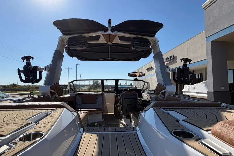 Slide: The Image of 2022 Nautique Super Air Nautique G25 Paragon boat interior with luxury seating and advanced features. - 80