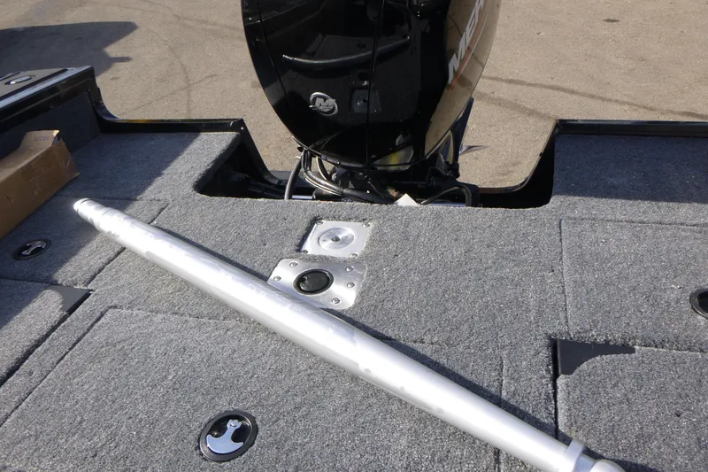 Slide: The Image of 2026 Tracker Targa V-19 Combo boat deck with motor and pole. - 12