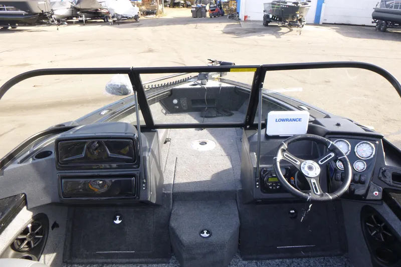 Slide: The Image of Dashboard of 2026 Tracker Targa V-19 Combo boat with gauges and controls. - 26