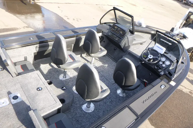 Slide: The Image of 2026 Tracker Targa V-19 Combo boat interior layout, featuring seating and storage compartments. - 6