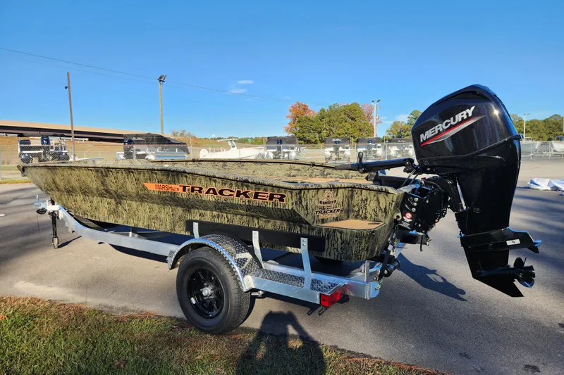Slide: The Image of 2026 Tracker Grizzly 1756 T Marsh boat with Mercury engine on trailer. - 4