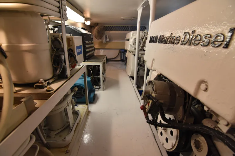 Slide: The Image of Engine room of 1999 Viking 58 Convertible yacht with marine diesel engines. - 44