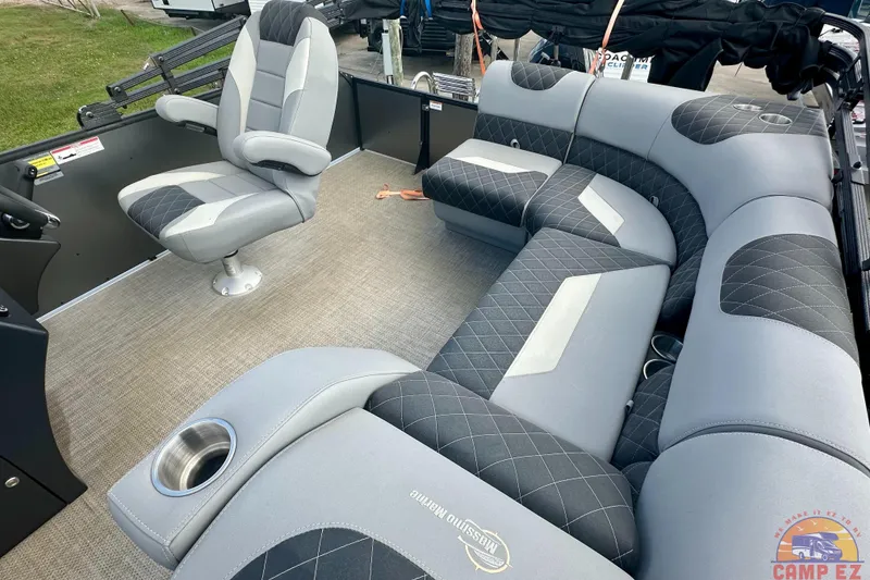 Slide: The Image of Luxurious seating on 2024 Massimo P-21R pontoon boat with quilted upholstery and cup holders. - 18