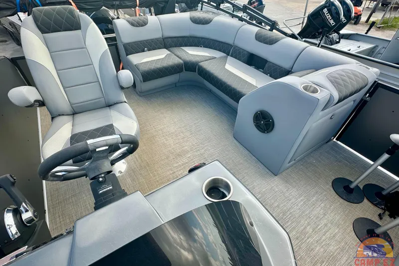 Slide: The Image of 2024 Massimo P-21R boat trailer with ladder and metal components on grassy area. - 21