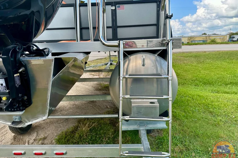 Slide: The Image of 2024 Massimo P-21R boat with sleek design and Mercury engine, under clear blue sky. - 22