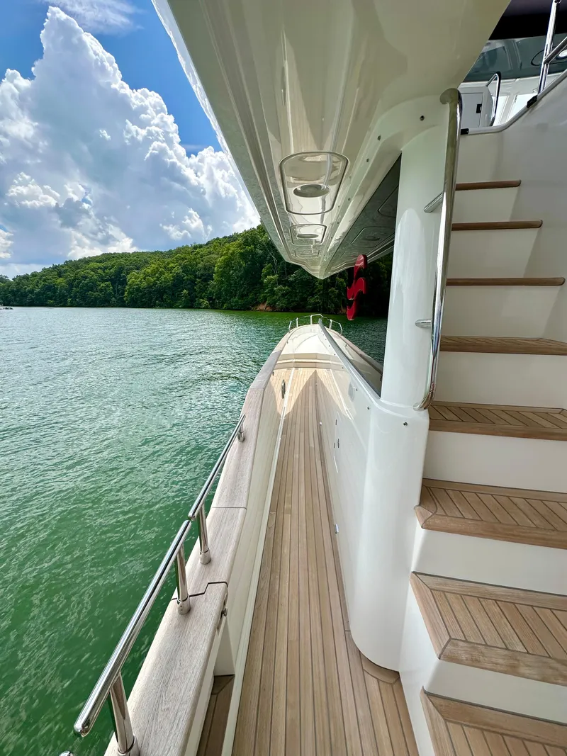 Slide: The Image of 2021 Sirena 58 yacht with teak deck and scenic lake view - 25