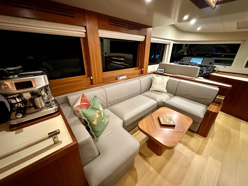Slide: The Image of Luxurious interior of 2021 Sirena 58 yacht with modern furnishings and coffee machine. - 31