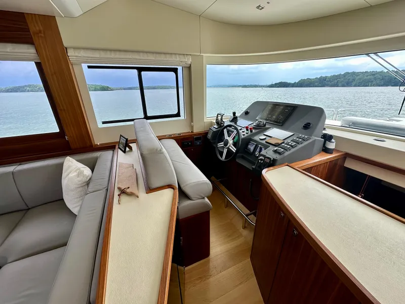 Slide: The Image of Interior of 2021 Sirena 58 yacht with helm station and seating area. - 36