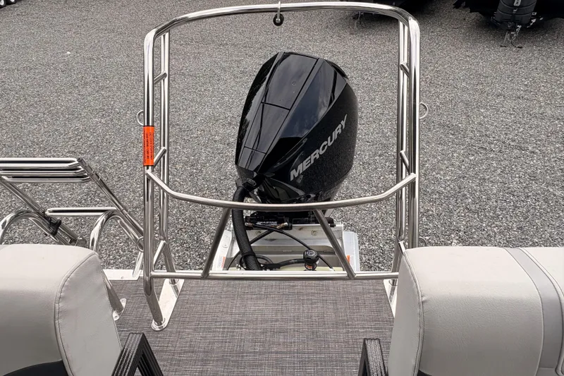 Slide: The Image of 2023 Crest Classic LX 220 SLRC boat with Mercury outboard motor, rear view. - 22