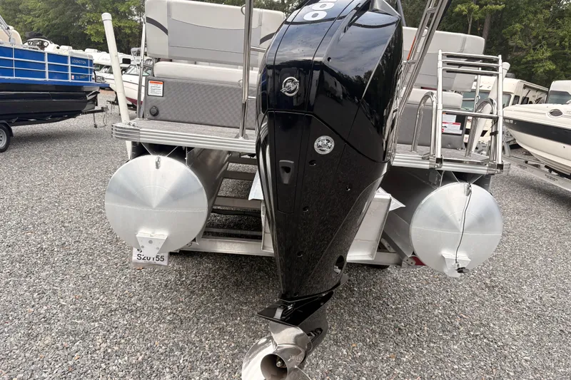 Slide: The Image of 2023 Crest Classic LX 220 SLRC pontoon boat with powerful outboard motor. - 3