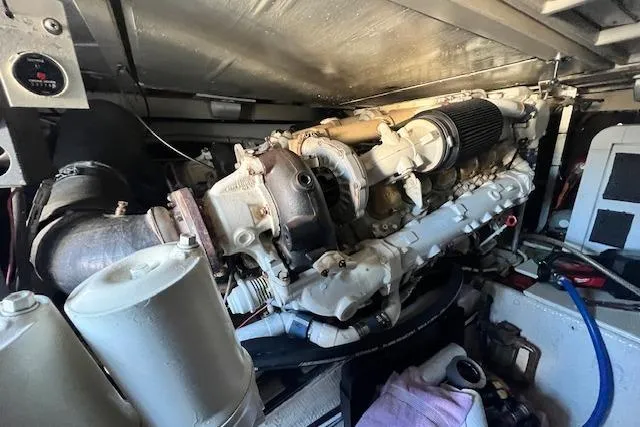 Slide: The Image of Interior of a 1995 Post 50 Convertible yacht with waterfront view. - 16