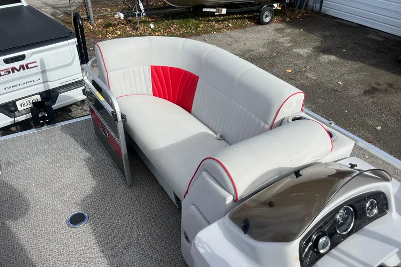 Slide: The Image of Apex Avanti 820 boat interior with white and red seating, 2020 model. - 1