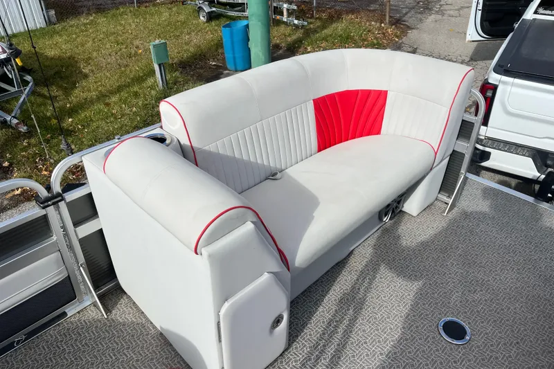 Slide: The Image of Luxurious seating on 2020 Apex Avanti 820 boat with red and white upholstery. - 12