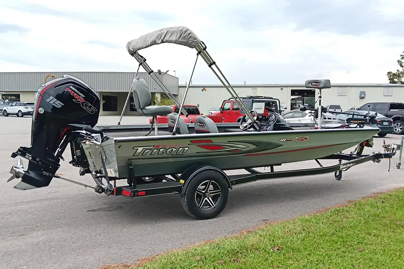 Slide: The Image of 2017 Triton 18 C TX boat with Mercury 115 Pro XS engine on trailer. - 7