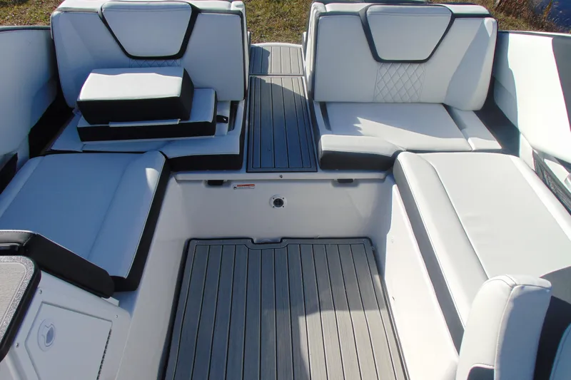 Slide: The Image of Luxurious seating area on 2026 Yamaha Boats 252SD, featuring sleek design and comfortable upholstery. - 16