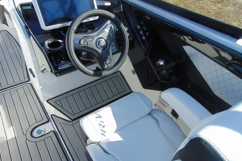 Slide: The Image of 2026 Yamaha Boats 252SD cockpit with sleek steering wheel and modern dashboard. - 19